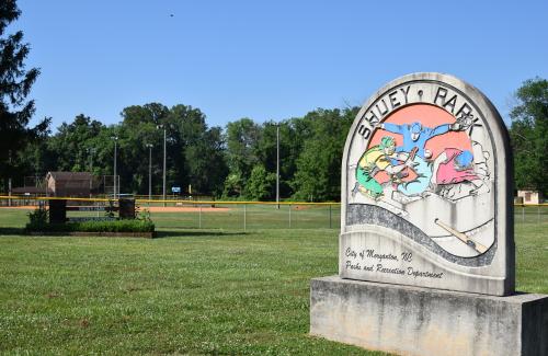 Shuey Park sign with baseball players - City of Morganton NC, Parks and Recreation Department