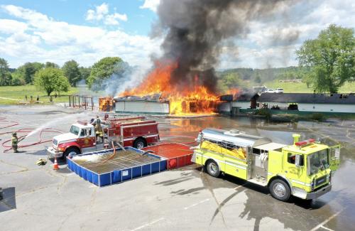 Firefighters training in a live burn scenario